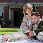 Young,Lovers,Dressed,In,Vintage,Clothing,Sitting,On,Picnic,Blanket.